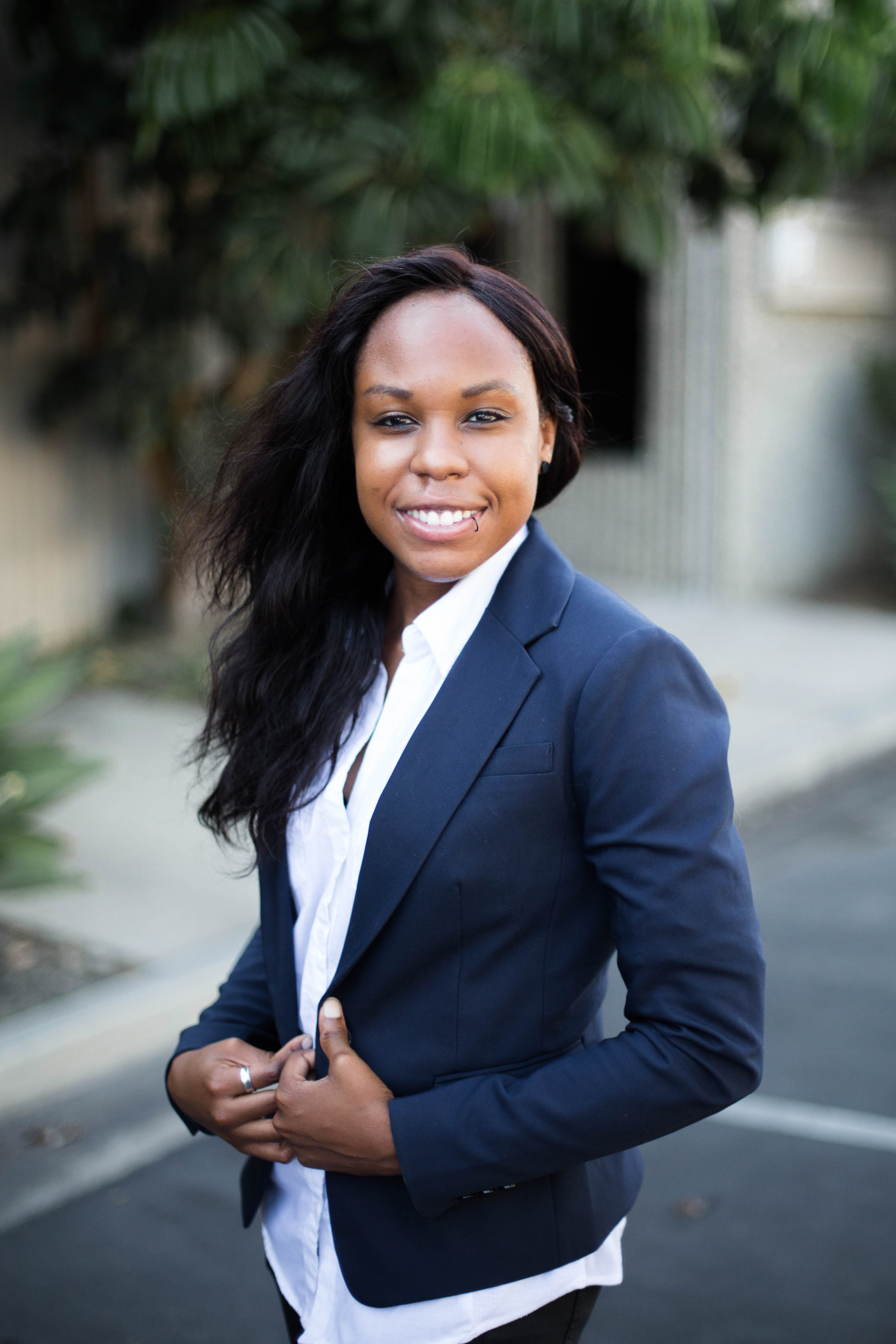 Official headshot of April Ewing, founder of SheHerd